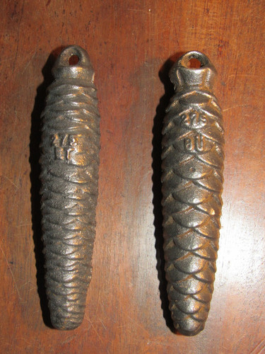 Two vintage 275g fir cone
