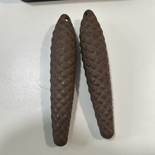 Pair vintage cast iron pine - cast,